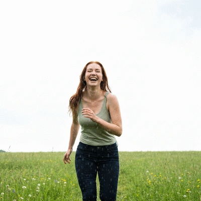 Lifestyle image of a person enjoying outdoor activities despite weather changes